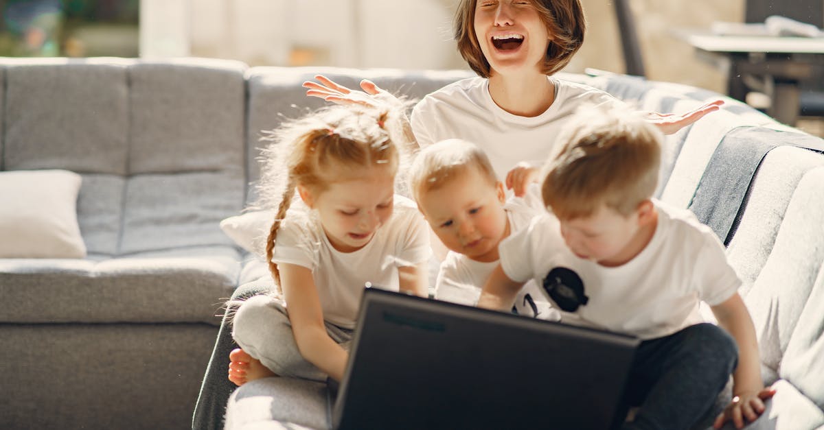Why do the children not cry when they are taken from their homes? - Stressed woman asking for help while sitting with small children playing on laptop together on sofa in living room