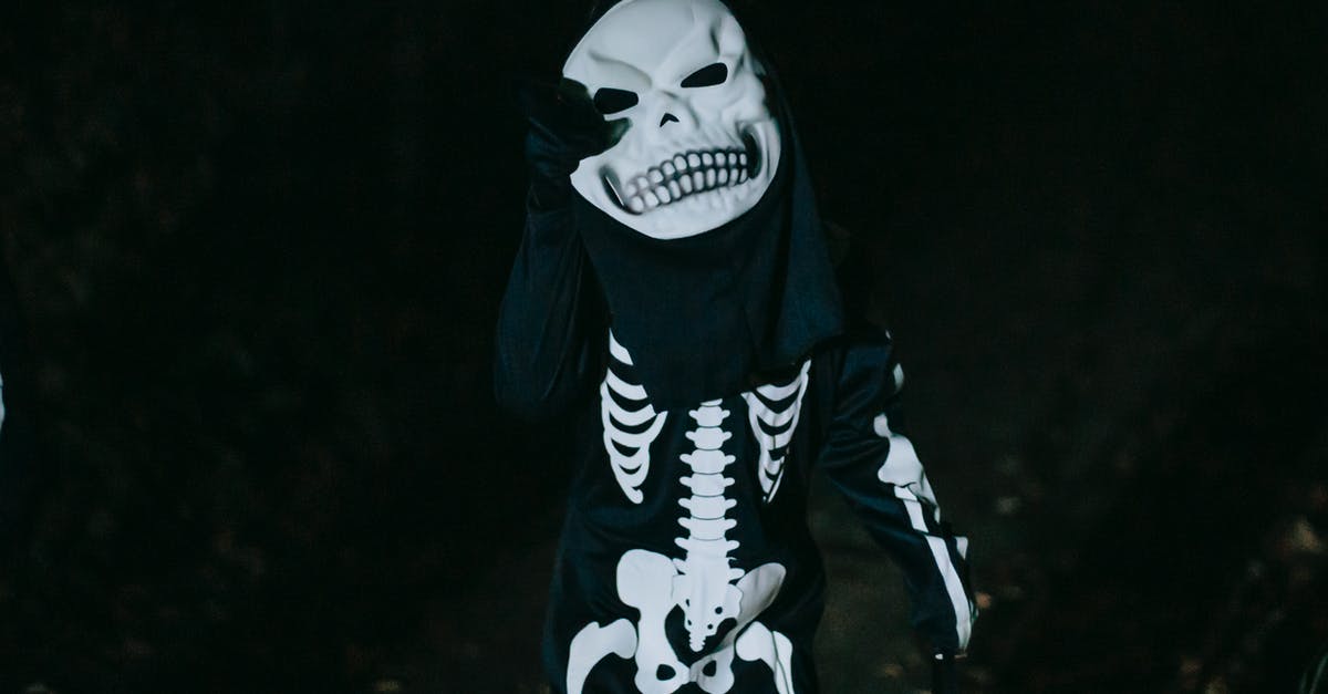 Why do the pirates have white teeth? - Unrecognizable kid in skeleton costume during Halloween