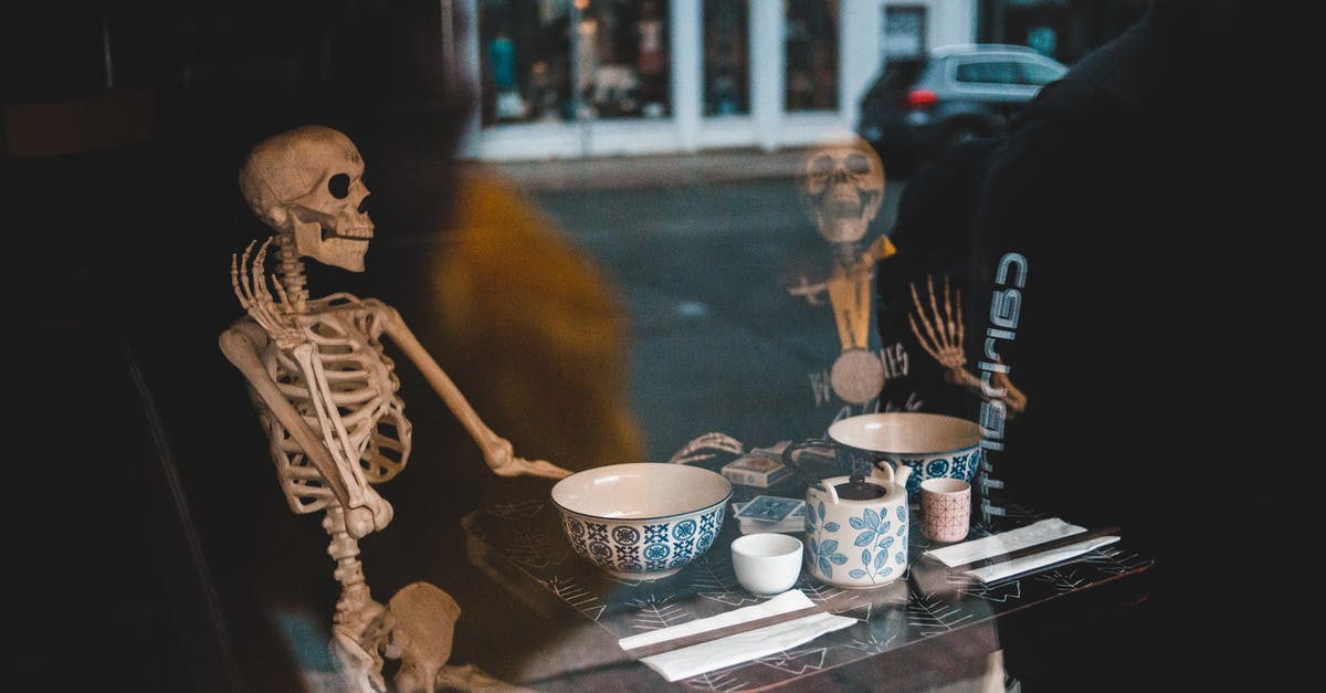 Why does Bandersnatch have dead ends? - Skeletons at table with dishware in cafe