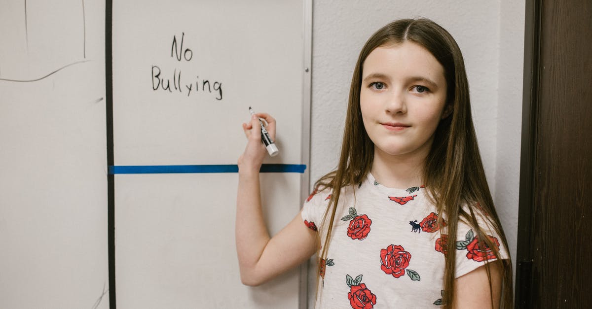 Why does Chaucer say he will write about blacksmiths? - Girl Showing a Message Against Bullying Written in White Board