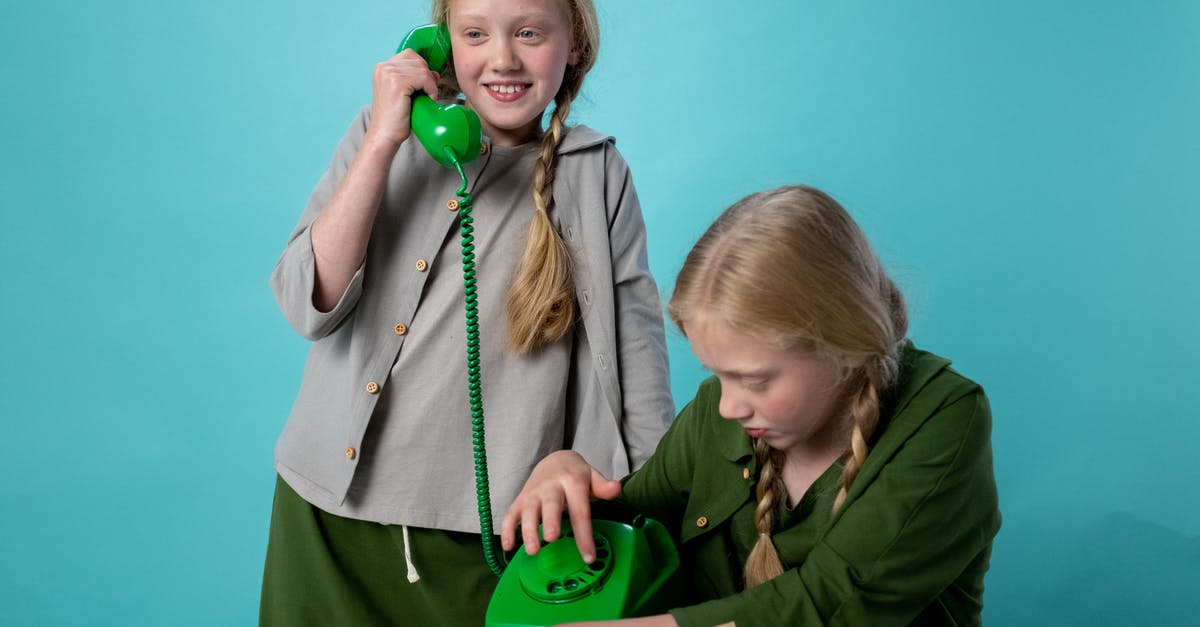 Why does Dr. Banks not know about having called the General? [duplicate] - 2 Girl Holding Green Plastic Toy