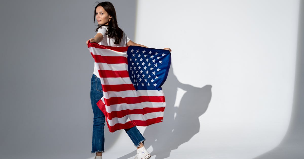 Why does Javert make Jean Valjean get the flag before releasing him? - Woman Holding an American Flag