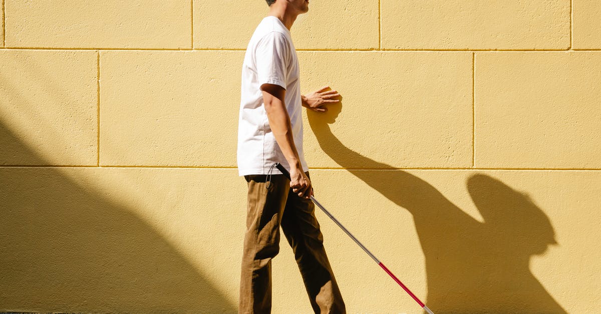 Why does Kathryn feel that she's already met Cole in 1990? - Photo of Man Walking on the Wall Side Using Cane 