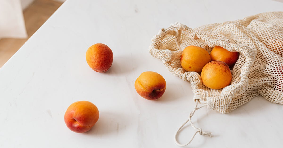 Why does Maximus refuse the sword from Cicero? - Organic sweet apricots in cotton sack placed on table