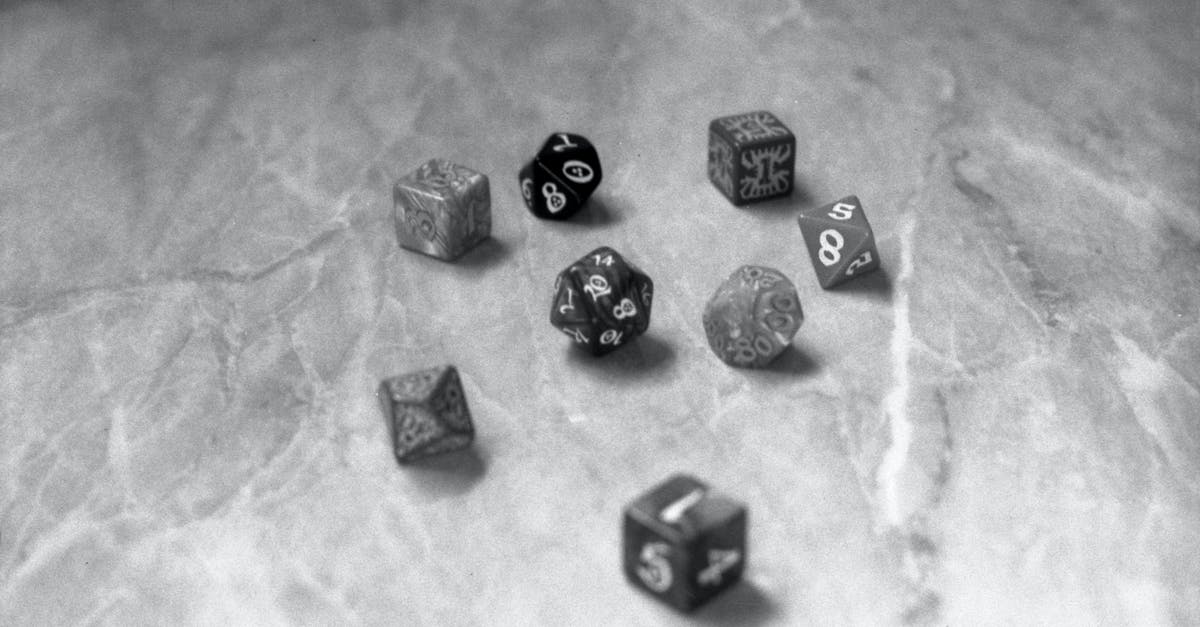 Why does Stan Lee play random extras in Marvel films? - Black and White Dice on Counter