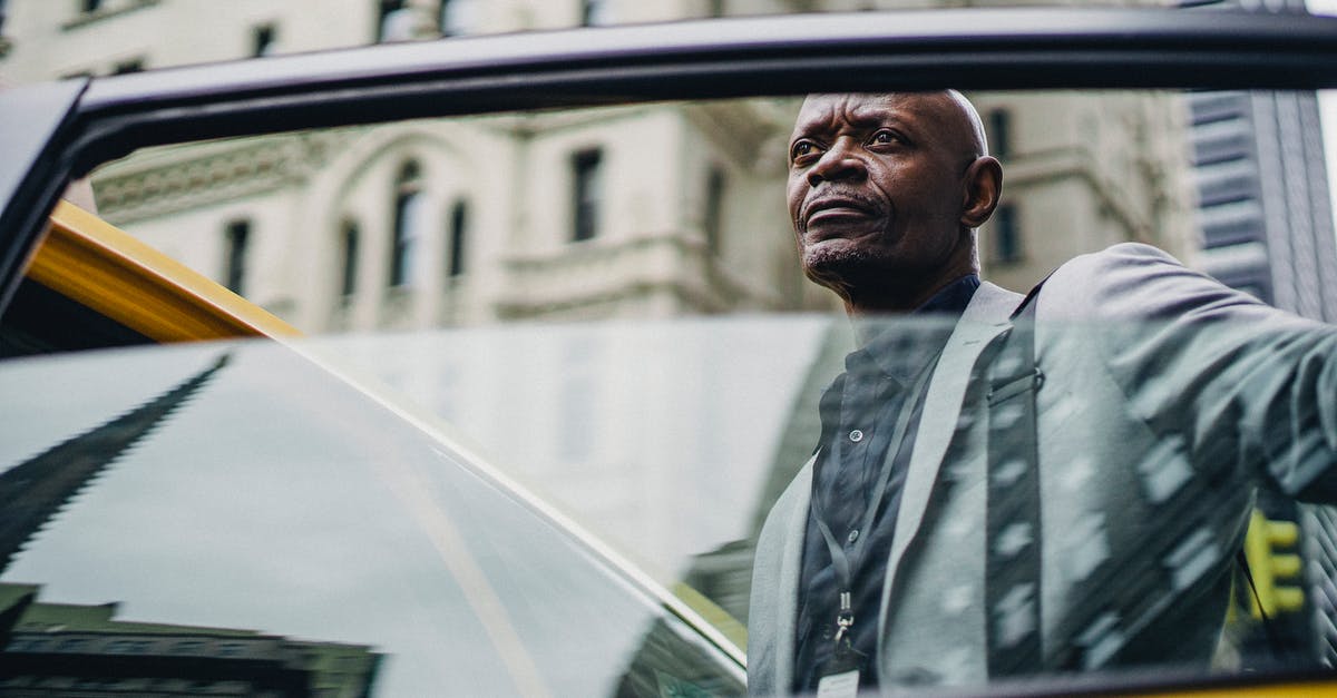 Why does the Hulk always move away from the town in every movie? [closed] - Pondering black man opening taxi door