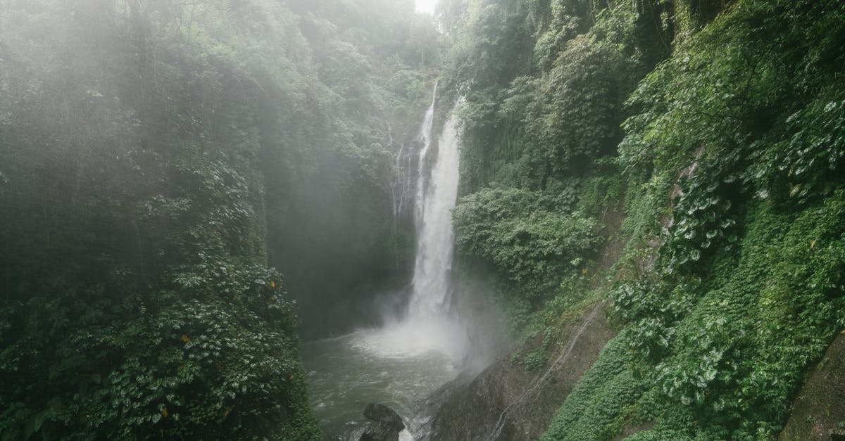 Why does the werewolf exhale a green mist? - Wonderful Aling Aling Waterfall among lush greenery of Sambangan mountainous area on Bali Island