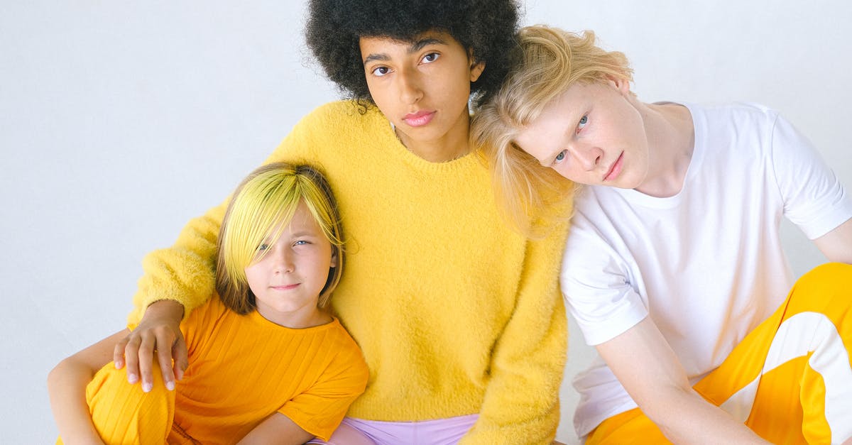 Why does Westley say Rodents of Unusual Size don't exist? - Diverse teenage friends with unusual hairstyles looking at camera on white background of studio