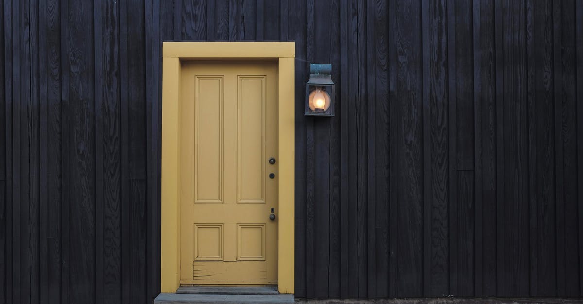 Why doesn't Gibbs lock his house? - Closed Door and Lighted Light Sconce