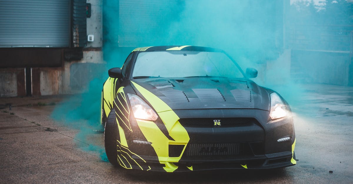 Why doesn't the bomb cause radiation poisoning to Gotham City? - Luxury car in green smoke