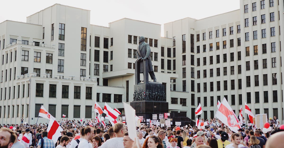 Why Flags are replaced with statue on disney logo building? - Protest in Belarus