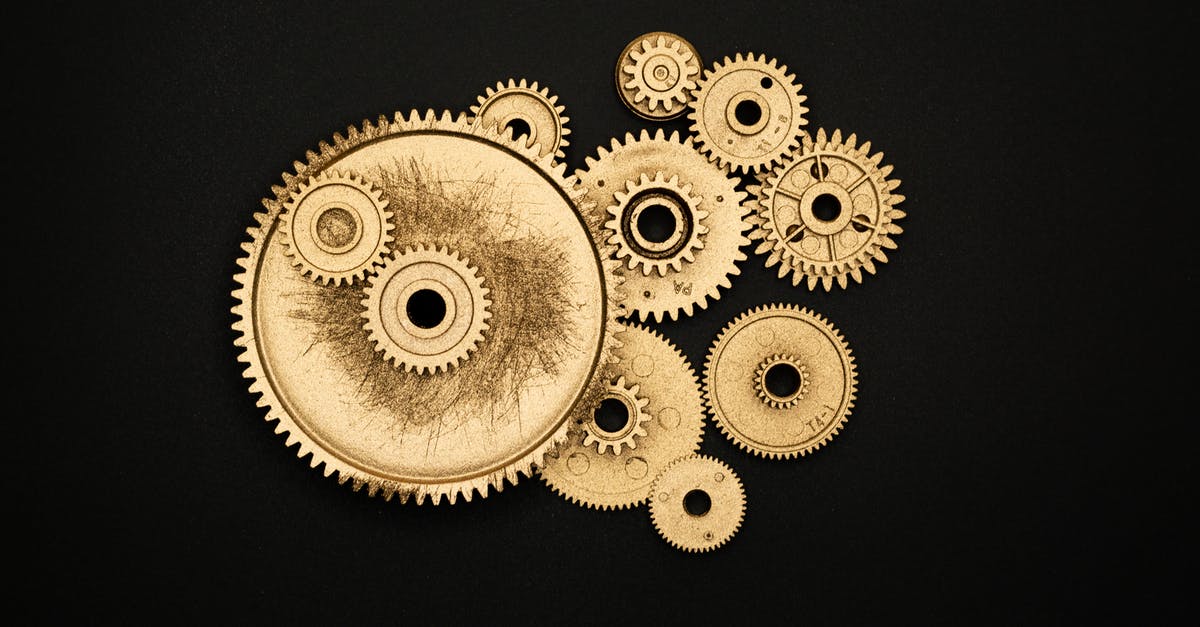 Why hasn't Team Machine told Control who was really behind Vigilance? - Photo of Golden Cogwheel on Black Background