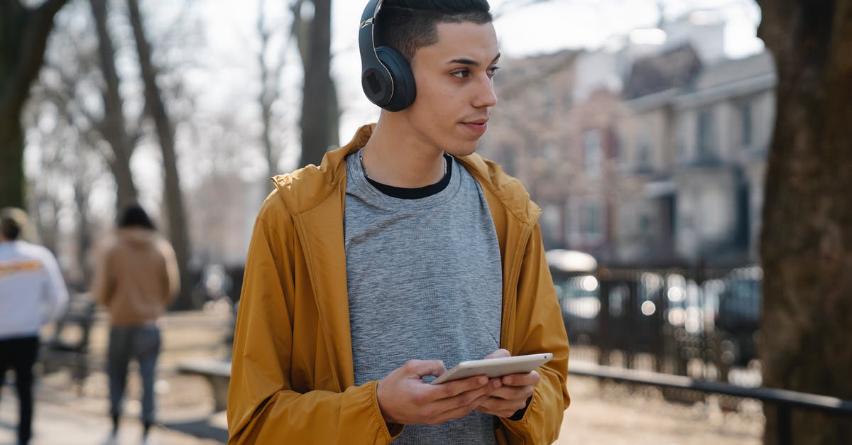Why is Australia in the Eurovision Song Contest 2018 when they aren't in Europe? - Teen listening to music while walking in park