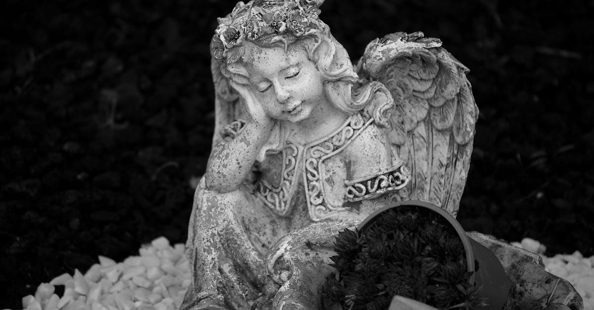 Why is Drunken Angel considered to be a masterpiece? - Grayscale Photo of Angel Statue