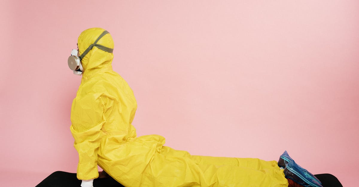Why is it that teenagers were immune to the virus before the virus came into existance? - Man In Yellow Protective Suit Stretching