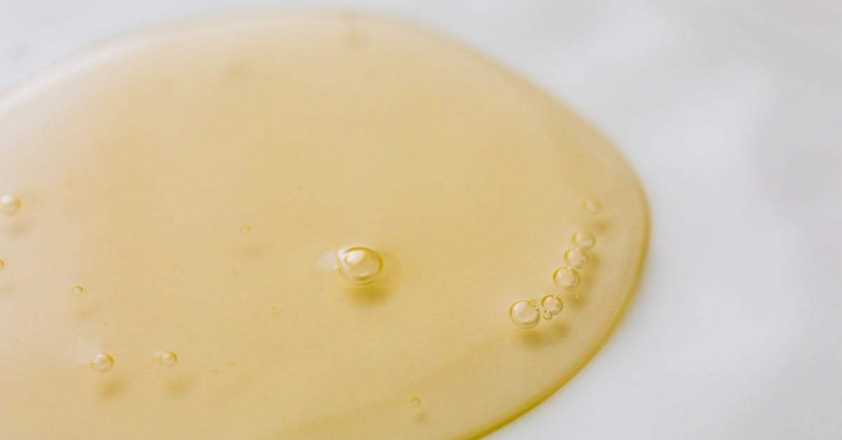 Why is lotion used as a metaphor for masturbation? - Transparent yellowish liquid on white surface
