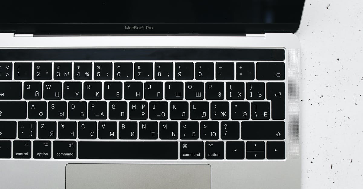 Why is Robert against liquid-plasma type screens? - Macbook Pro Keyboard in Close-Up Photography 