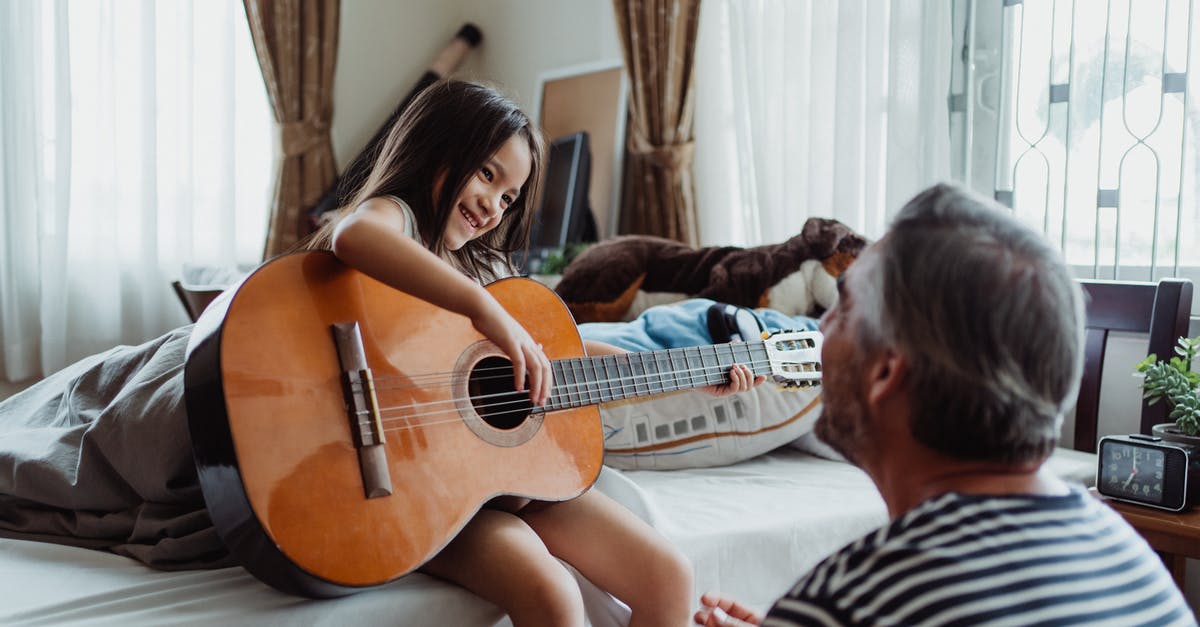 Why is stealing De la Cruz guitar a family matter? - Girl Playing Guitar for Her Dad