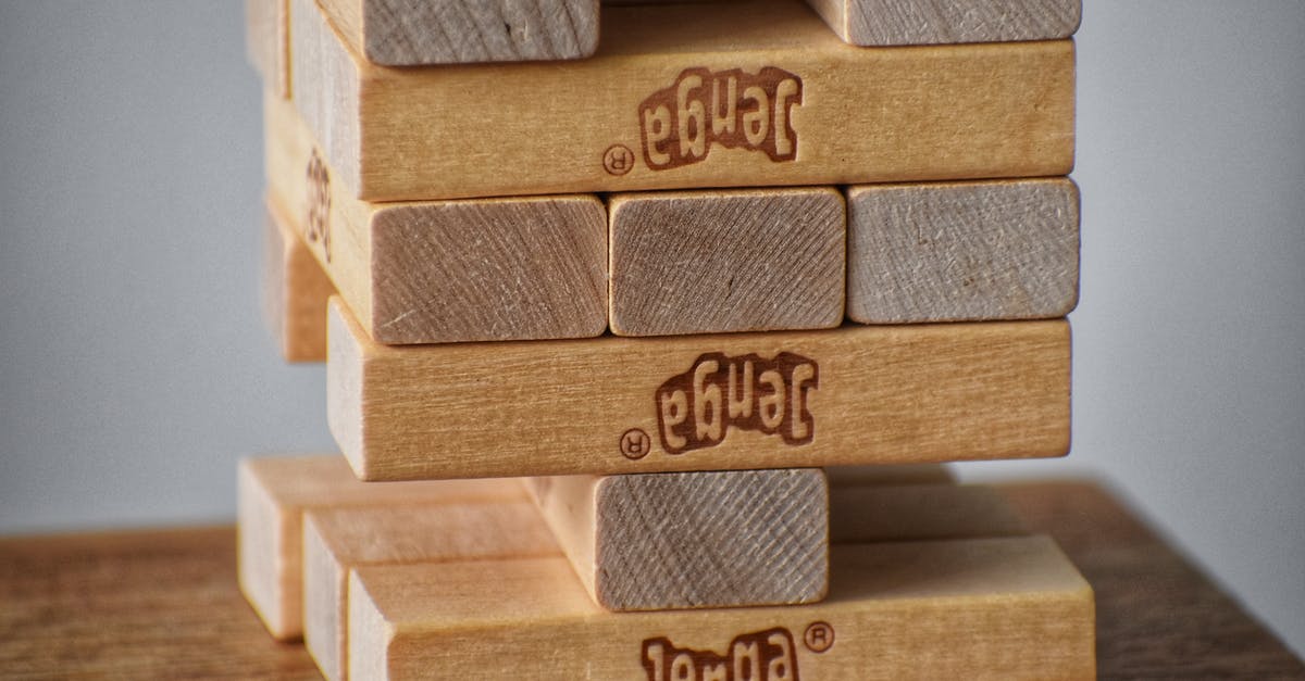 Why is the Baratheon sigil still shown on King's Landing in the Game of Thrones opening sequence? - Closeup of wooden blocks placed on top of each other for playing board game
