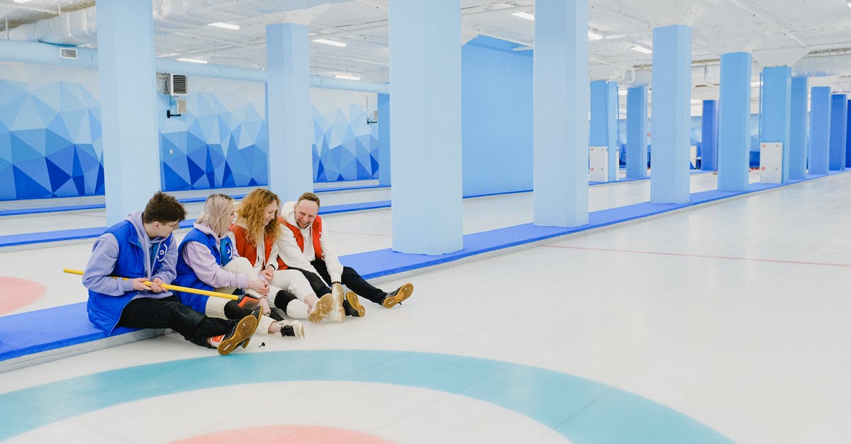 Why is the dialogue in Game of Thrones more "modern"? - Group of sitting people spending time in curling arena