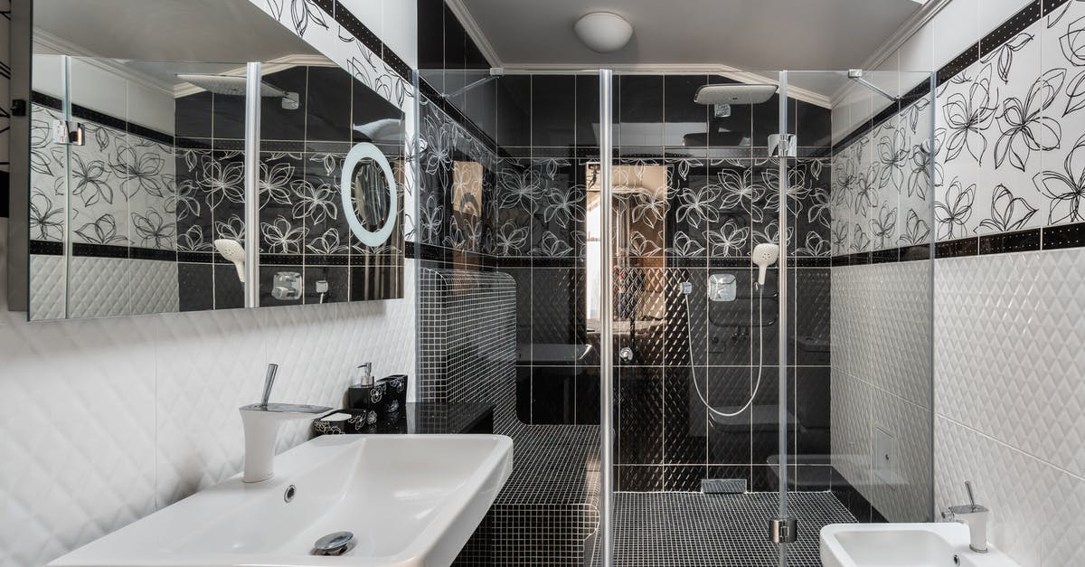 Why is the episode "Metalhead" of Black Mirror in black & white? - Modern bathroom with shower cabin