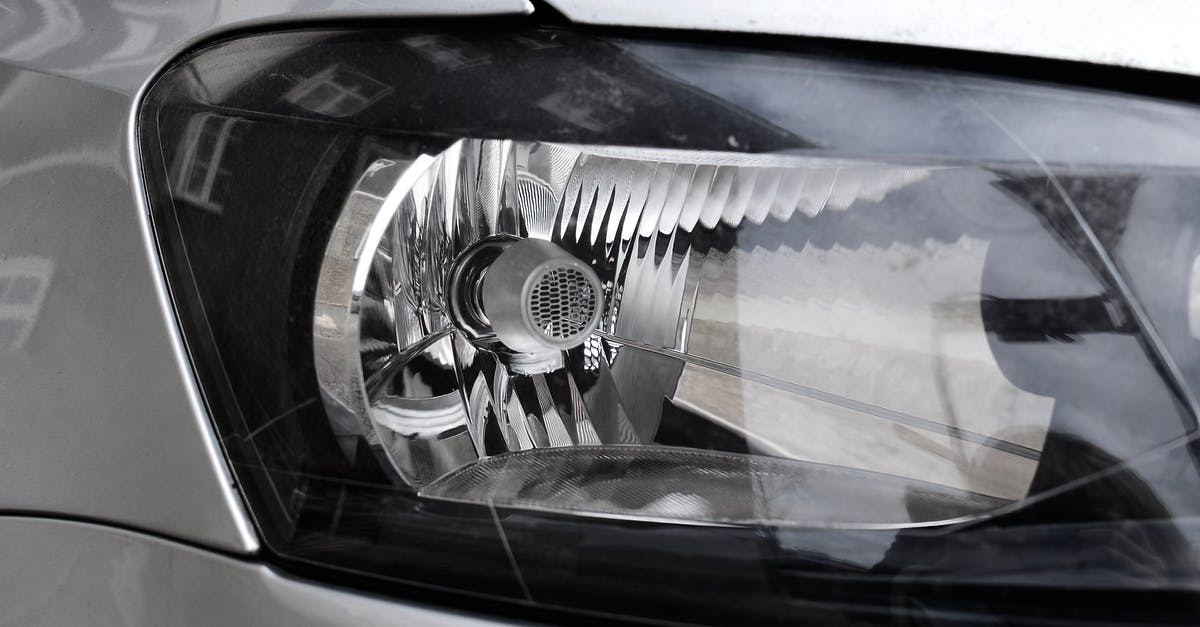 Why is The Prestige Tesla's machine actually "real"? - Shiny headlight of modern metallic car