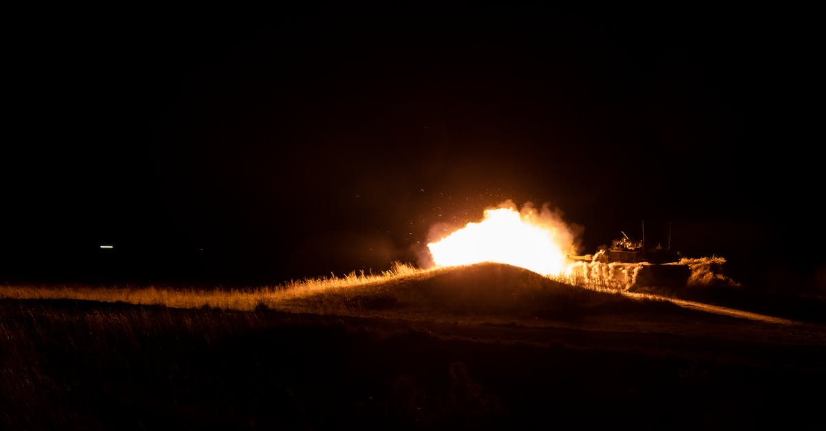 Why is Tom Hanks firing at the tank in Saving Pvt. Ryan? - A Bonfire Lighting the Battle Field