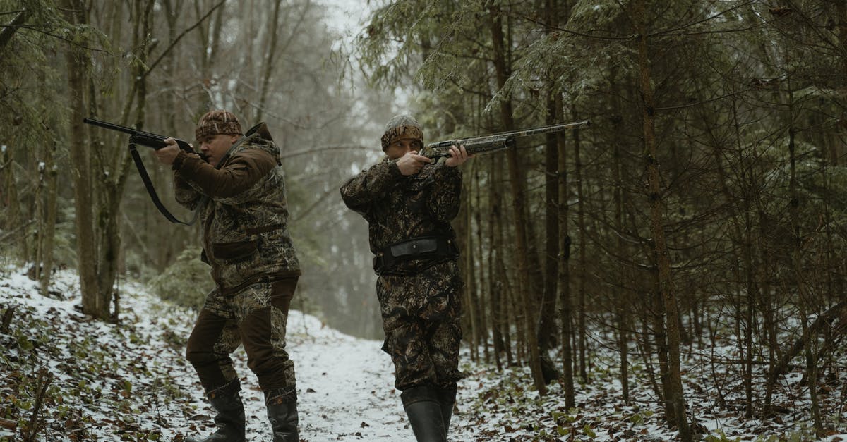 Why no Marvel One-Shot for The Winter Soldier? - Two Men Standing in the Woods Aiming Their Rifles