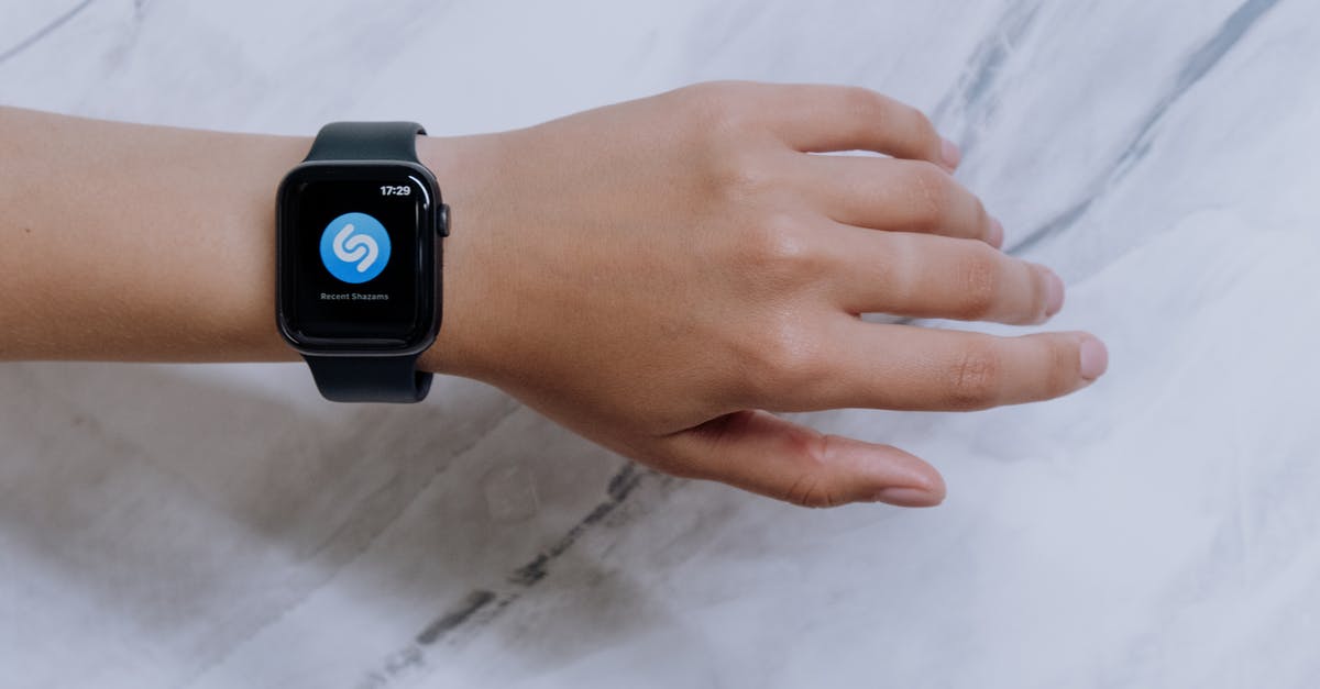 Why Shazam when there is already Superman? - Person Wearing Black Apple Watch
