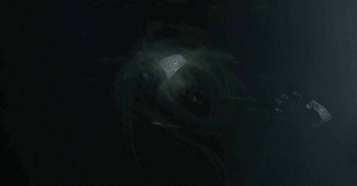 Why the different effects when Sirius Black appears in a fireplace? - Abstract dark background with human hand trace