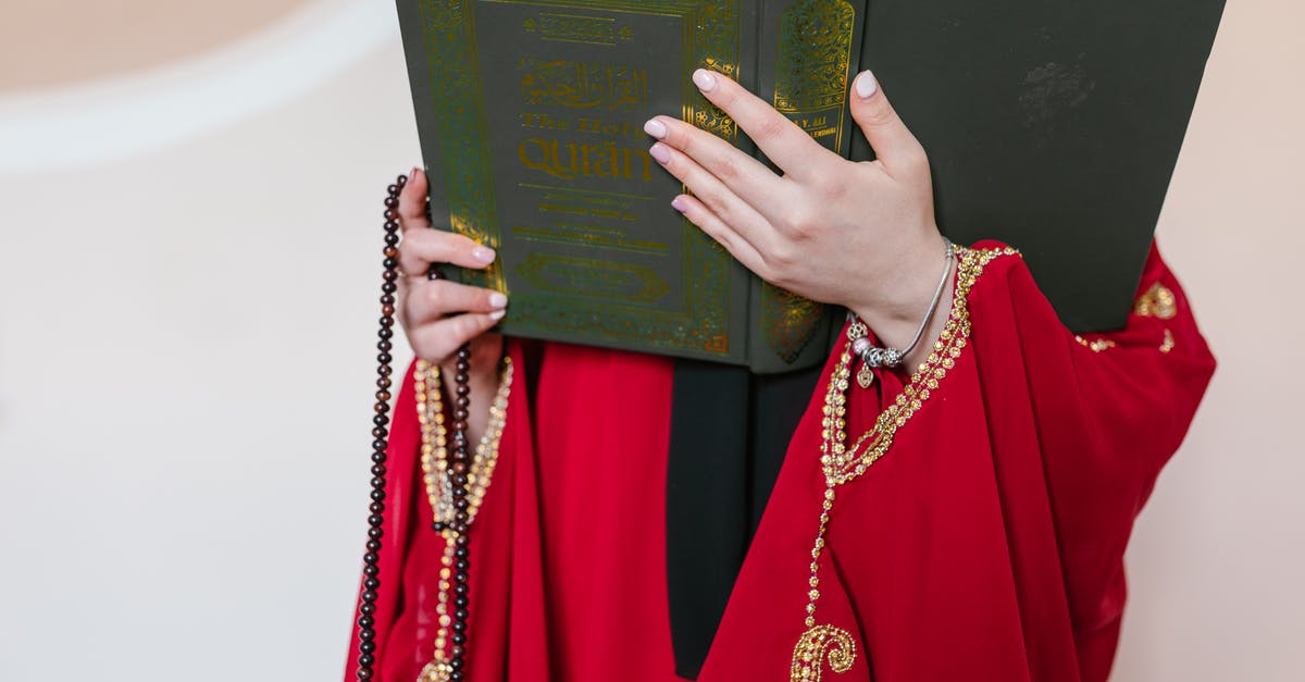 Why the shot of the Muslim Prayer in the opening credits scene? - Woman in Red  Traditional Clothing Holding a Book and Prayer Beads