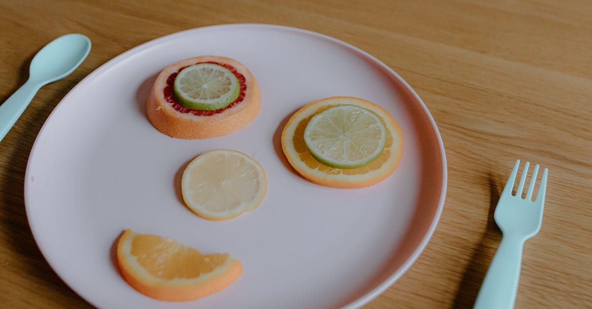 Why was Captain Léon changing spoon positions of Jane Clayton's plate after she left? - Multicolored citrus fruit creating funny face on plastic plate