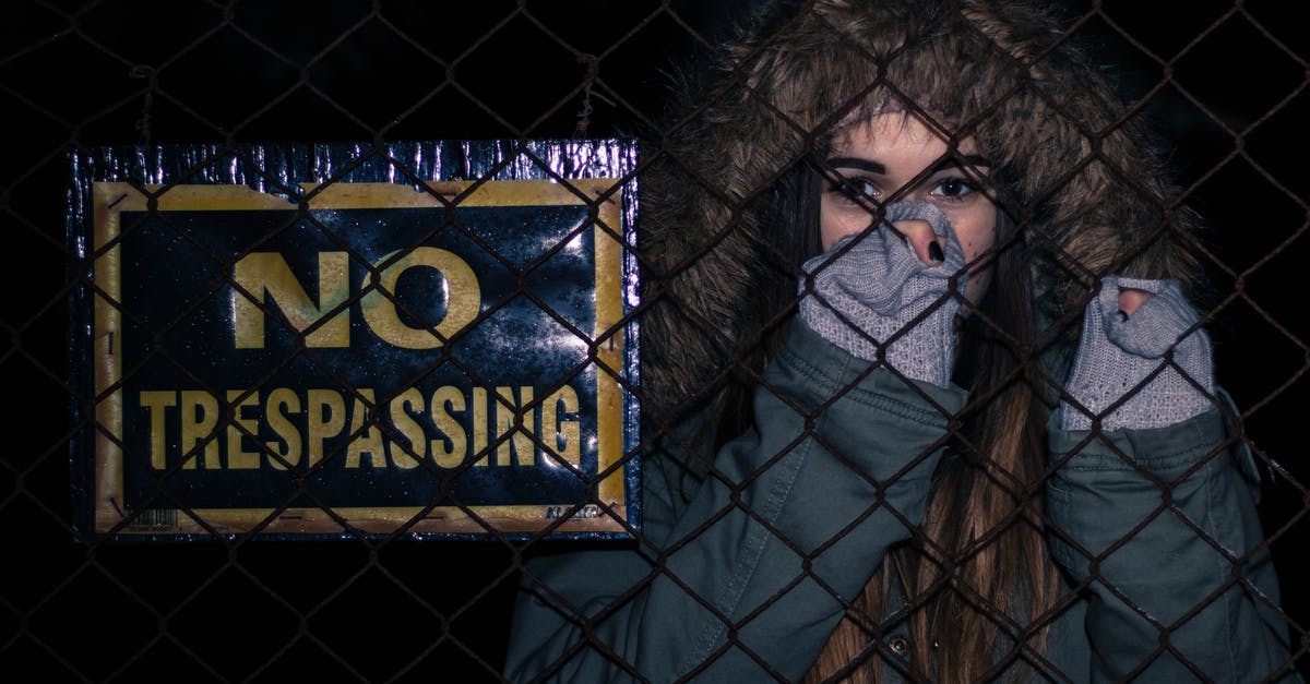 Why was Finn even wearing the jacket in the first place? - Woman Behind Black Chainlink Fence With No Trespassing Signage
