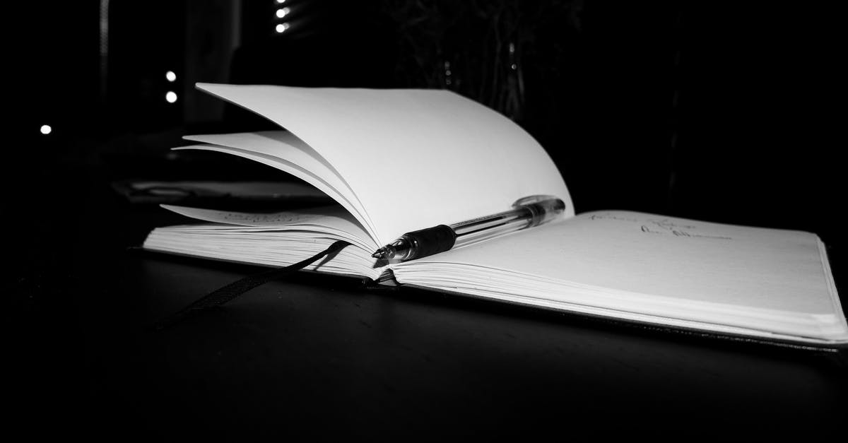 Why was the main antagonist so open about his plan? - Opened notebook with black pen and bookmark on black surface