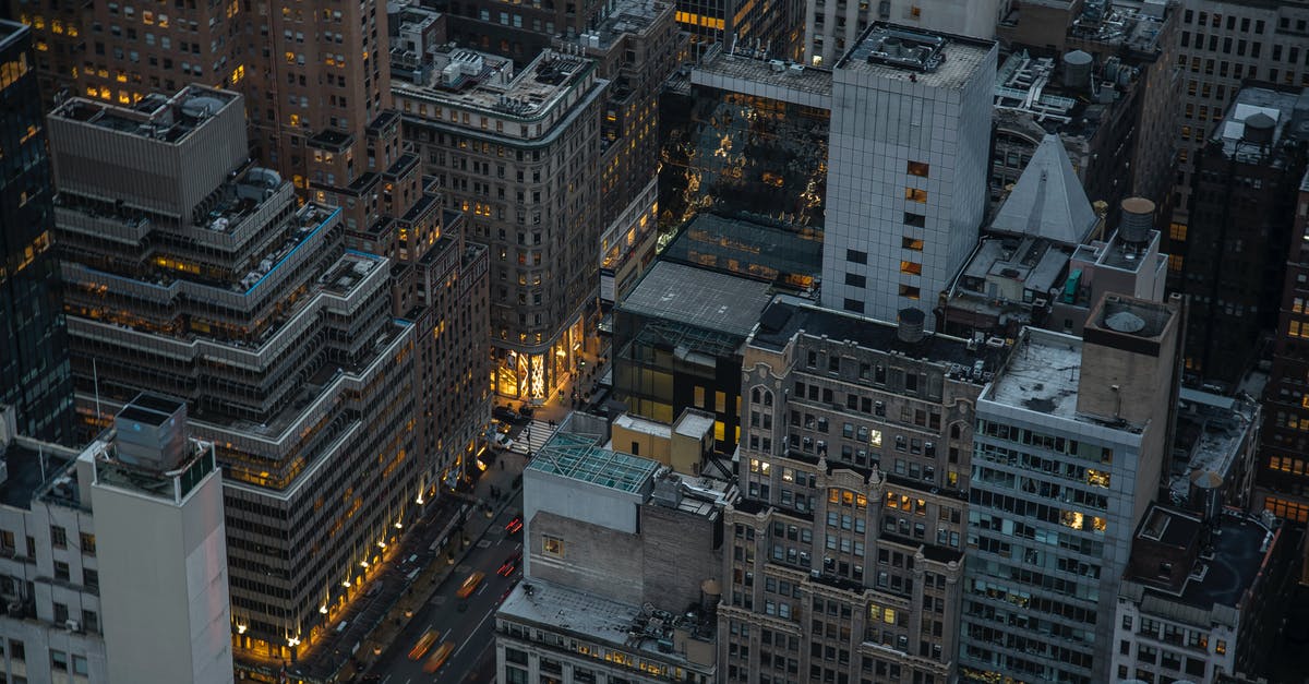 Why was there light emanating from Batman's suit? - Aerial View Of City Buildings