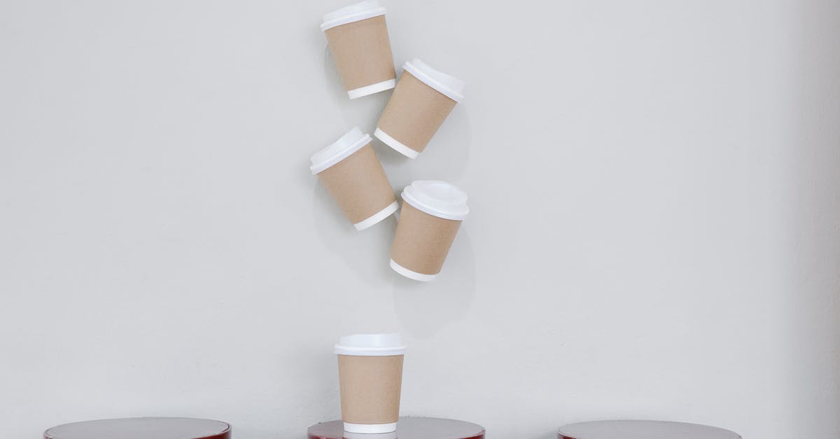 Why was this Major McBride's only objective in Ad Astra? - Set of takeaway cups hanging on white wall