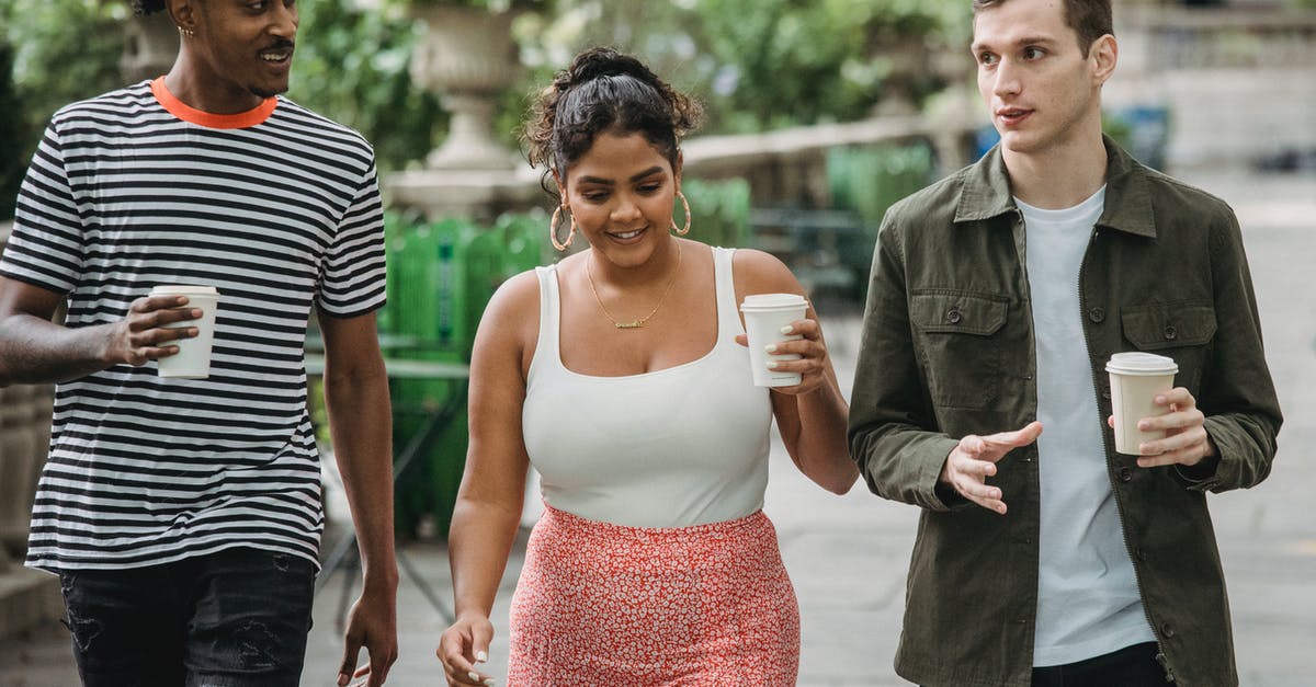 Why was Vanessa apparently allowed to go free? - Joyful young multiethnic students in casual clothes discussing lessons while walking together in park with takeaway cups of coffee