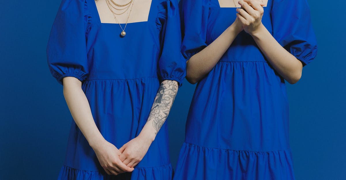 Why would "the stranger" continuously dress the same way? - Women in Blue Dress