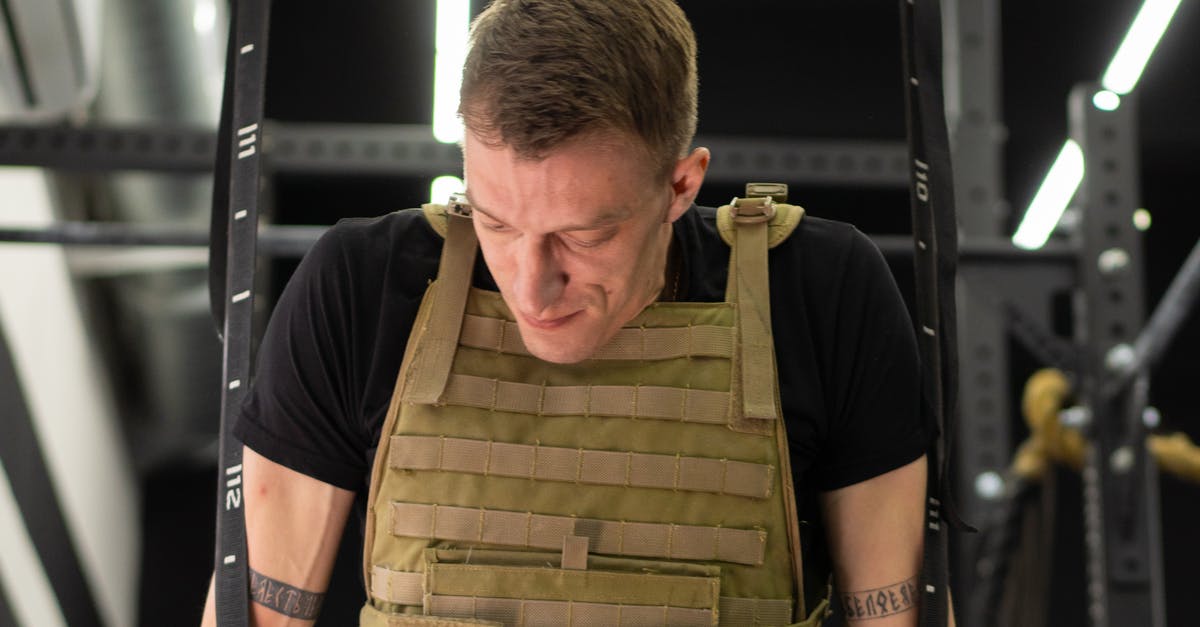 Would Get Out's earplugs really have worked? - A Man Wearing a Weighted Vest